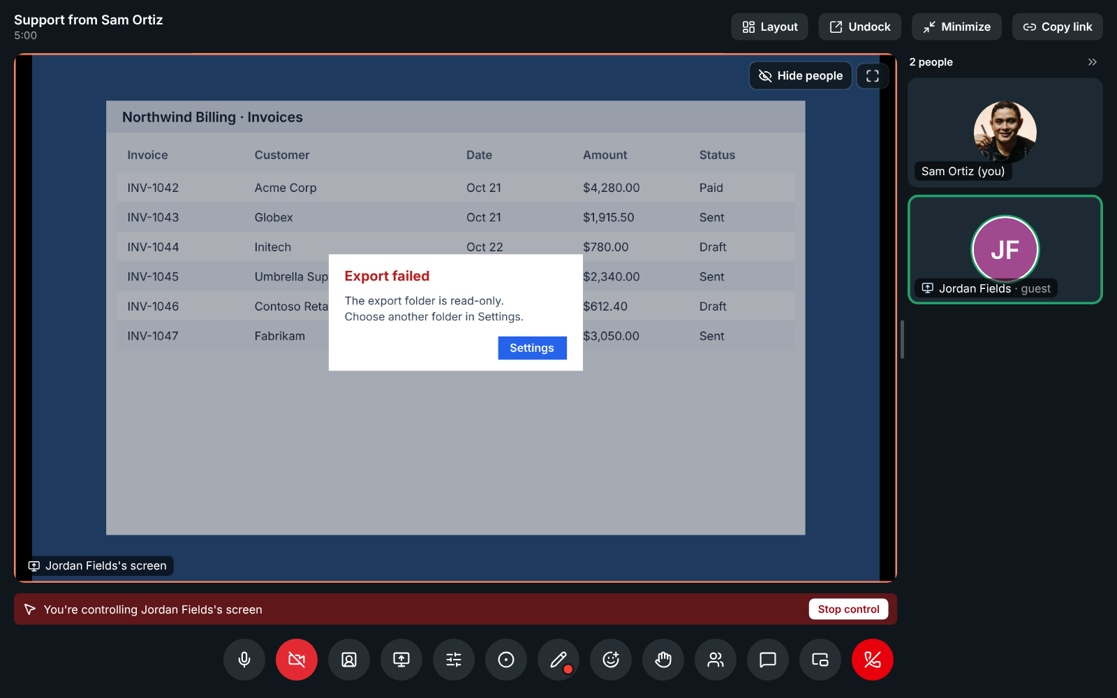 An agent controlling a customer's shared screen during a support session